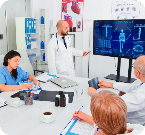 Technician checking healthcare system integration and performance.